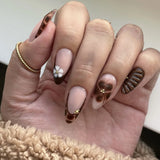 Popxstar  24pcs Winter Black False Nails Set Acrylic Leopard Print French Tip Almond Fake Nail Art with Shiny Powder Design Press on Nails