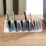 Popxstar  Multi-slot tablet and phone charging storage box, placement stand, plastic holder, portable with multiple card slots.