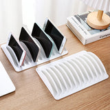 Popxstar  Multi-slot tablet and phone charging storage box, placement stand, plastic holder, portable with multiple card slots.